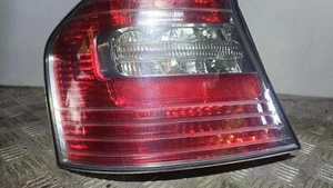 SUBARU LIBERTY LEFT TAILLIGHT 4TH GEN, SEDAN, CLEAR TYPE, 4 BULB, 09/03-06/06 03 - Picture 1 of 3
