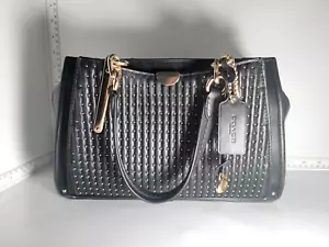 Coach Dreamer con trapuntatura e rivetti oro/nero - Foto 1 di 11