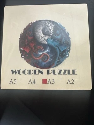 New In Box Wooden Red/white/blue Dragon Circular Puzzle - Image 1 of 3