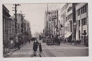TARJETA POSTAL Japón FRONT STREET TOKYO ca 1930 B&W coches sin usar tranvía bicicleta - Imagen 1 de 2