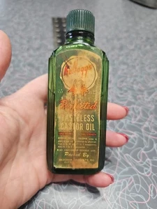 VINTAGE KELLOGG’S GESCHMACKLOSES RIZINUSÖL grünes Glas  - Bild 1 von 6