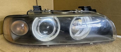 01-03 BMW E39 540i 525i 530i M5 PASAJERO OEM Conjunto de faros de xenón HELLA RH Foto 1 de 4