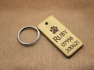 Personalised Solid Wood Engraved Pet Paw in Front Pet Tag - Picture 1 of 5