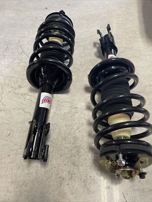 SUM-SA11200, LOADED STRUT ASSEMBLY STOCK RIDE HEIGHT. FORD 04-05 EXPLORER. PAIR - Image 1 of 4