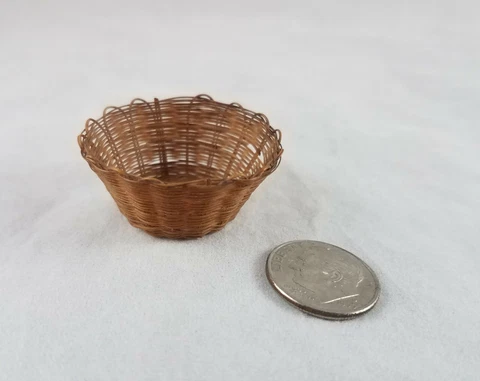Delicate miniature basket 1-3/8 inch diameter by 5/8 inch tall. Fine workmanship Cover