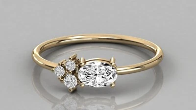 Impresionante anillo cristalino blanco ovalado y blanco moissanita en oro amarillo de 10K Foto 1 de 3