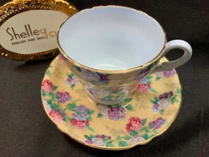 SHELLEY IVORY SUMMER GLORY CHINTZ CUP AND SAUCER (DEMI) - GOLD TRIM #13455 - Picture 1 of 5