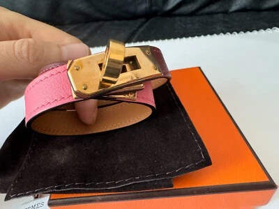 Brazalete envolvente de cuero HERMES Kelly Double Tour Verso Rouge H ORO ROSA Foto 1 de 4