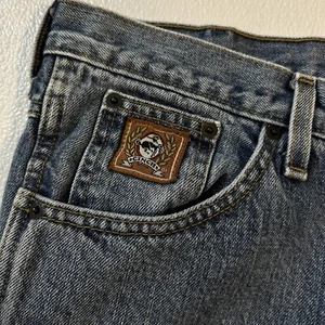 34 x 34,5 ~ Etikett: 34 x 34 ~ Cinch Herren Bronze Etikett schmale Passform Jeans ~ MB90532001 - Bild 1 von 9