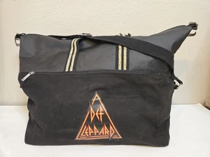 Bolso de mano Def Leppard negro de viaje con cierre de cremallera con correa de lona negro - Imagen 1 de 9