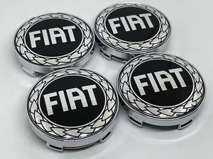 4 TAPPI COPRIMOZZO FIAT 60 mm CERCHI BORCHIE BRAVO TIPO PUNTO PANDA 500 DUCATO - Foto 1 di 3