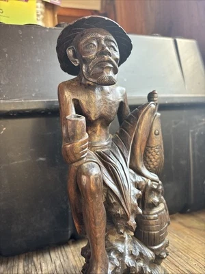 Antique Chinese Carved Indonesia Agarwood Chenxiang Wood Statue of a Fisherman - Image 1 of 4