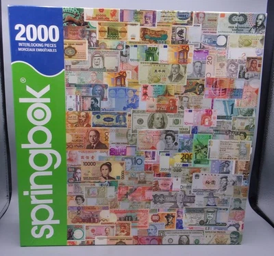 Springbok 2000 Pc  Jigsaw Puzzle "Color of Money" World Currency - Image 1 of 2