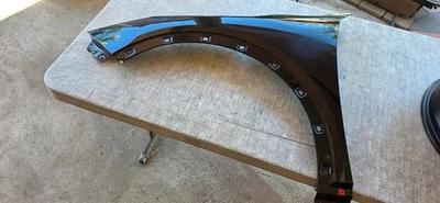 2025 Kia K4 Front Left Driver Fender Shell Cover Panel Black OEM - Image 1 of 3