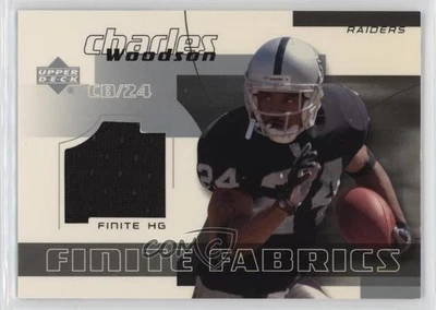 2004 Upper Deck Finite HG Finite Fabrics Charles Woodson #CW HOF - Image 1 of 3