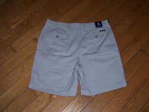 NUEVOS PANTALONES CORTOS CAQUI DELANTEROS PLANOS CHAPS CON 36" PRECIO DE VENTA SUGERIDO POR EL FABRICANTE $50.00 - Imagen 1 de 2