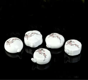 1 pieza gotas de agua de porcelana patrón de flor de ciruela moliendo tinta y tonificando - Imagen 1 de 3