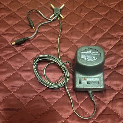 Universal AC DC Power Adapter Output 1.5-3-4.5-6-7.5-9-12 V 1000 mA 120V 60 Hz - Image 1 of 4