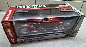1.18 ERTL 1937 Cord 812 Convertible Road & Track Auto World Boxed Free POST - Picture 1 of 12