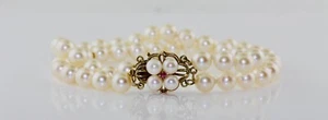 14K yellow gold 7" 2-row 6-7mm cultured pearl bracelet with ruby clasp - Picture 1 of 3