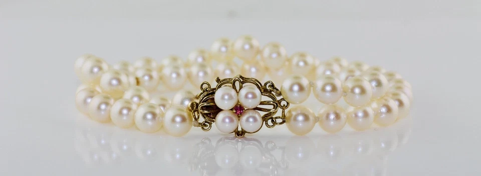 14K yellow gold 7" 2-row 6-7mm cultured pearl bracelet with ruby clasp - Image 1 of 3