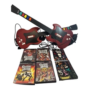 Guitar Hero II Gitarren (2 Lot Konvolut) Guitar Hero 1,2 World Tour mit Aufklebern - Bild 1 von 6