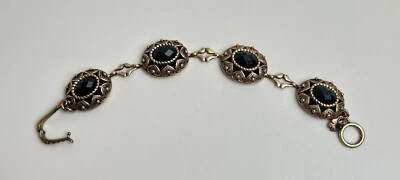 Brazalete de filigrana Lucky Brand tono dorado con piedra negra 7,5" Foto 1 de 4