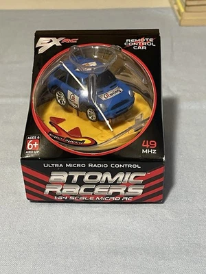 2012 EXRC Atomic Racers 1:64 Scale Micro Remote Control Car Blue Race Car - Image 1 of 4