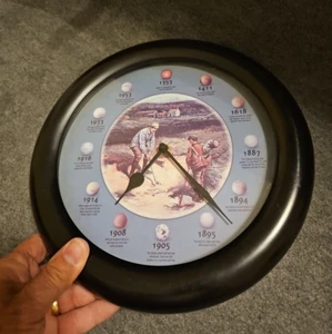 History of Golf Balls Quartz Wall Clock, Balls From 1353-1953, Black Frame, 12" - Picture 1 of 5