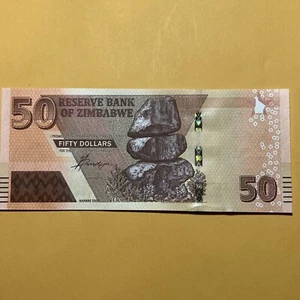 Zimbabwe 50 Dollars Current Uncirculated Banknote - Dated 2020 - New Issue - Picture 1 of 4