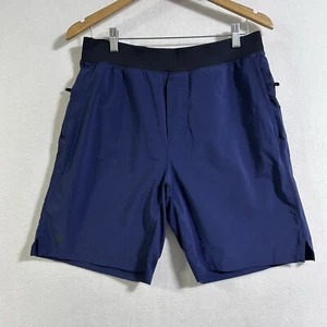 Fabletics Sportshorts Herren 30" blau einfarbig Stretch ungefüttert 7" Reißverschlusstasche Fitnessstudio - Bild 1 von 8