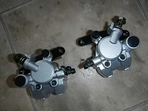 NEW FRONT right left BRAKE CALIPER SET 2011-2012 YAMAHA YFM125 RAPTOR 125 YFM - Picture 1 of 12