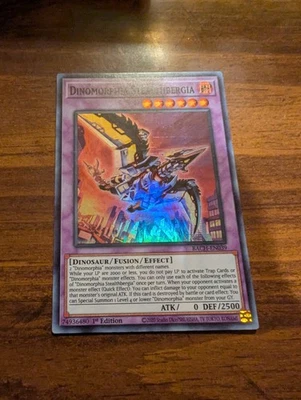 Yugioh Trading Card: Dinomorphia Stealthbergia BACH-EN Super Rare 1st Ed NM - Image 1 of 2