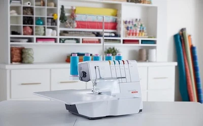 Bernette b68 serger machine--NEW IN THE BOX- WARRANTY--ONE OF A KIND/LAST ONE! - Image 1 of 3