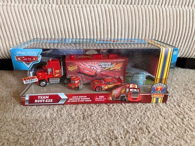 Disney Pixar Cars Team Rust-Eze Hauler Mack Lightning McQueen Pistón Taza Noches Foto 1 de 4