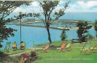 15242 - Postcard showing deckchairs on the Cobb, Longmoor gardens, Lyme Regis