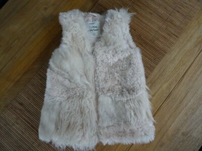 Chaleco de piel con cremallera frontal sintética rosa pálido para niña de Zara Talla 5 cm 110 Foto 1 de 4