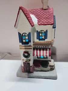 1992  Christmas Village House Grocery.  Lighted - Picture 1 of 5