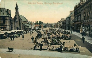 BISHOP AUKLAND ENGLAND UK MARKET PLACE STREET SCENE OLD POSTCARD - Picture 1 of 2