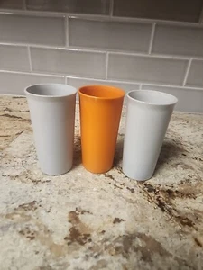 VINTAGE SET OF 3 TUPPERWARE #116 9oz TUMBLER CUPS 2 GRAY AND 1 ORANGE COLORS - Picture 1 of 8