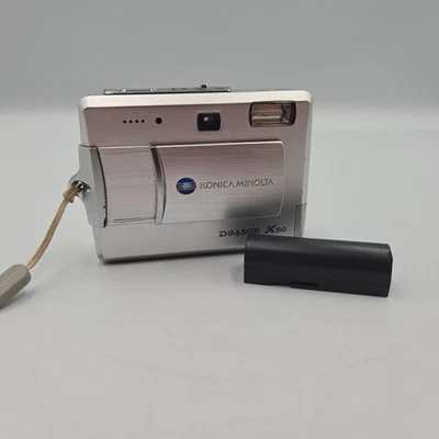 Konica Minolta DiMAGE X50 Digital Camera 5MP – Tested – Fully Working – Japan - Image 1 of 4