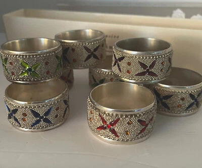 Juego de 8 servilleteros exclusivos enchapados en plata Pier 1 Foto 1 de 4