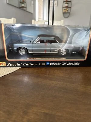 1965 pontiac gto hurst edition maisto 1/18 special edition light blue new  - Image 1 of 2