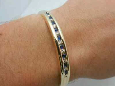 Brazalete brazalete de zafiro creado en laboratorio de corte redondo de 5 quilates enchapado en oro amarillo de plata 925 Foto 1 de 4