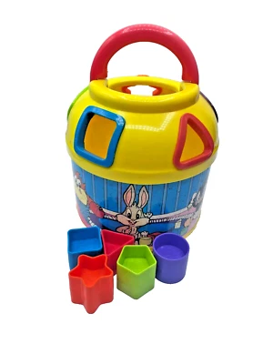 Juguete clasificador de formas vintage Tyco Baby Looney Tunes multicolor Foto 1 de 4