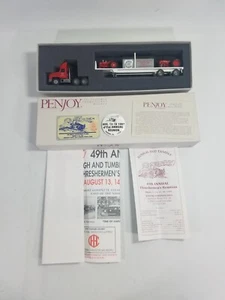 1997 Penjoy Diecast 1/64 Mack Truck 49th Rough & Tumble con trattore internazionale - Foto 1 di 12