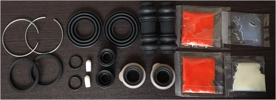 MAZDA RX-7 FC3S OEM Pinza de freno revisión kit de reparación par trasero JDM Foto 1 de 1