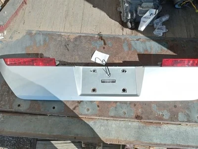 02-05 BMW E66 7645LI REAR TRUNK LICENSE TRIM W/ TAIL LIGHTS SILVER OEM USED 5113 - Image 1 of 4