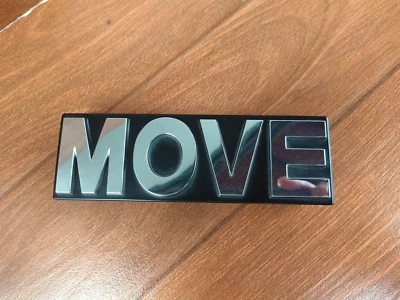 Daihatsu MOVE Custom 1st Gen Front Grille EMBLEM BADGE GENUINE P/N 75341X4951 - Image 1 of 4