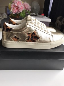 kurt geiger white and gold trainers